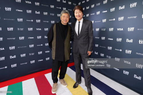 TORONTO, ONTARIO - SEPTEMBER 13: (L-R) Hirokazu Kore-edaand  Kang Ho Song attends the "Broker" Premi