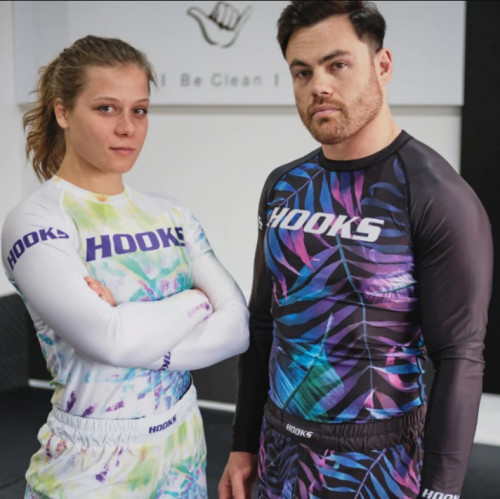 Hooks Jiujitsu provides superior rashguards with innovative technologies made for performance and style. We stock a large variety of BJJ rash guards in different designs, colours and sizes. We have something for every single style and budget. We have all sizes to fit men and women. Our designs are sublimated and won't peel off or fade. Wearing our BJJ rashguard will help you to stay safe during the training. Our products have undergone testing and refining before they reach you. We make our rash guards with a supreme quality polyester blend that causes them to be lightweight and breathable. Our BJJ rashguards are supposed to fit tight to your body to help keep chafing at a minimum. We have simple designs in ranked colors of premium material for a light, smooth and comfortable fit. Order the one to get it shipped to you. For more info, visit https://hooksbrand.com/collections/rashguards